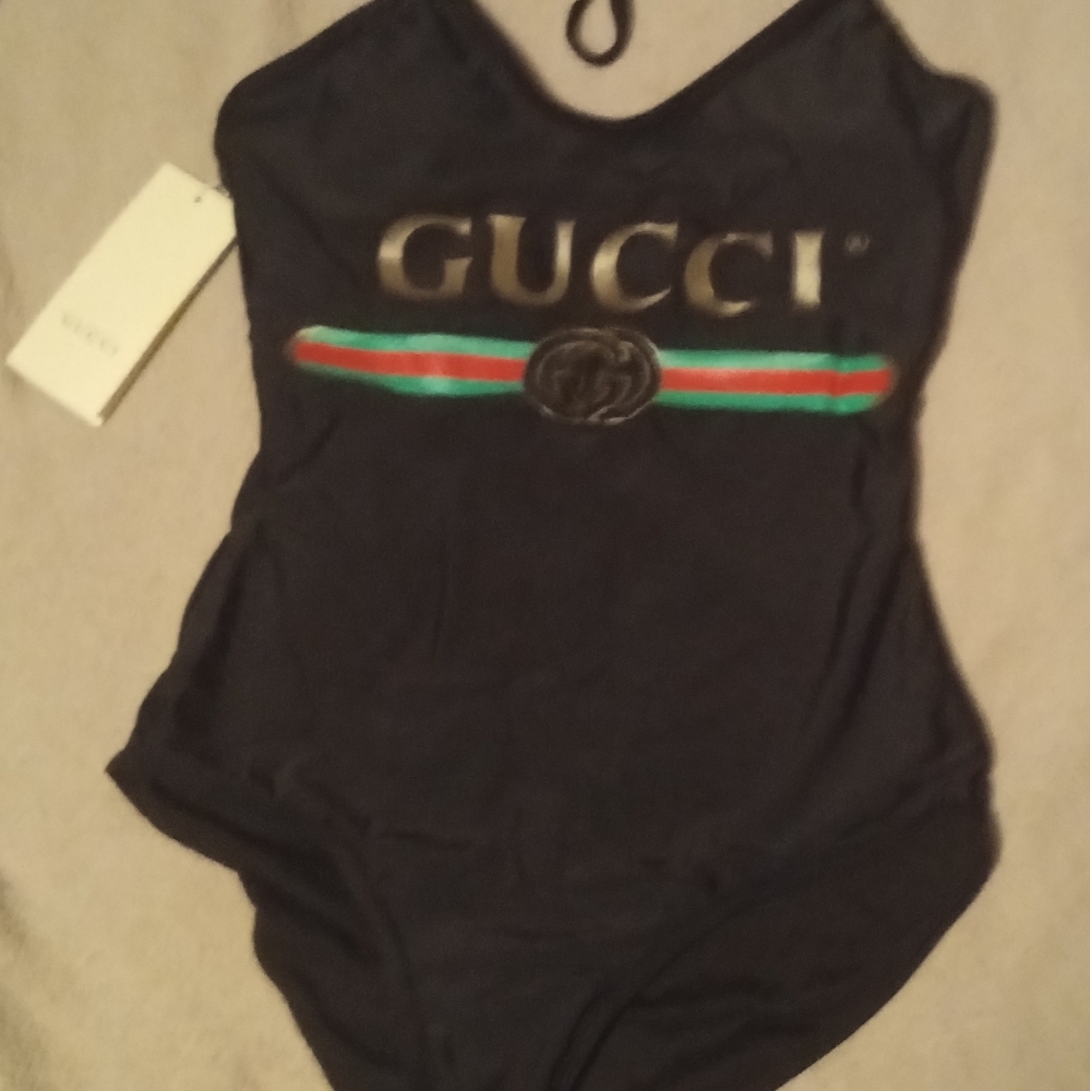 Gucci bathing suit, price tag was removed but this has never been worn brand new